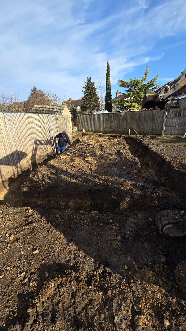 Excavation. Site dug out and levelled ready for foundations.